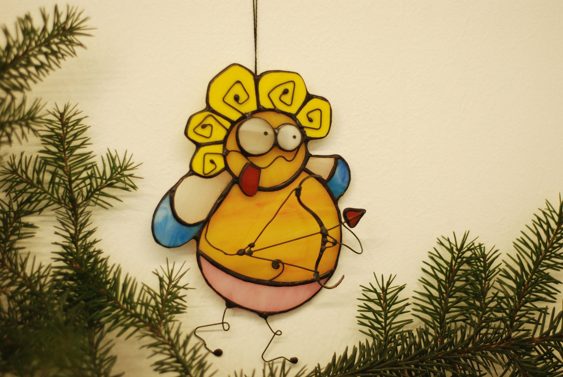 Cupid suncatcher hanging in window — romantic love light catcher, Valentine's Day window art