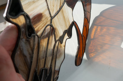 Gothic goat skull stained glass close-up — hand-cut glass pieces, eerie bone detail, witch halloween horror decor, Kyiv artist