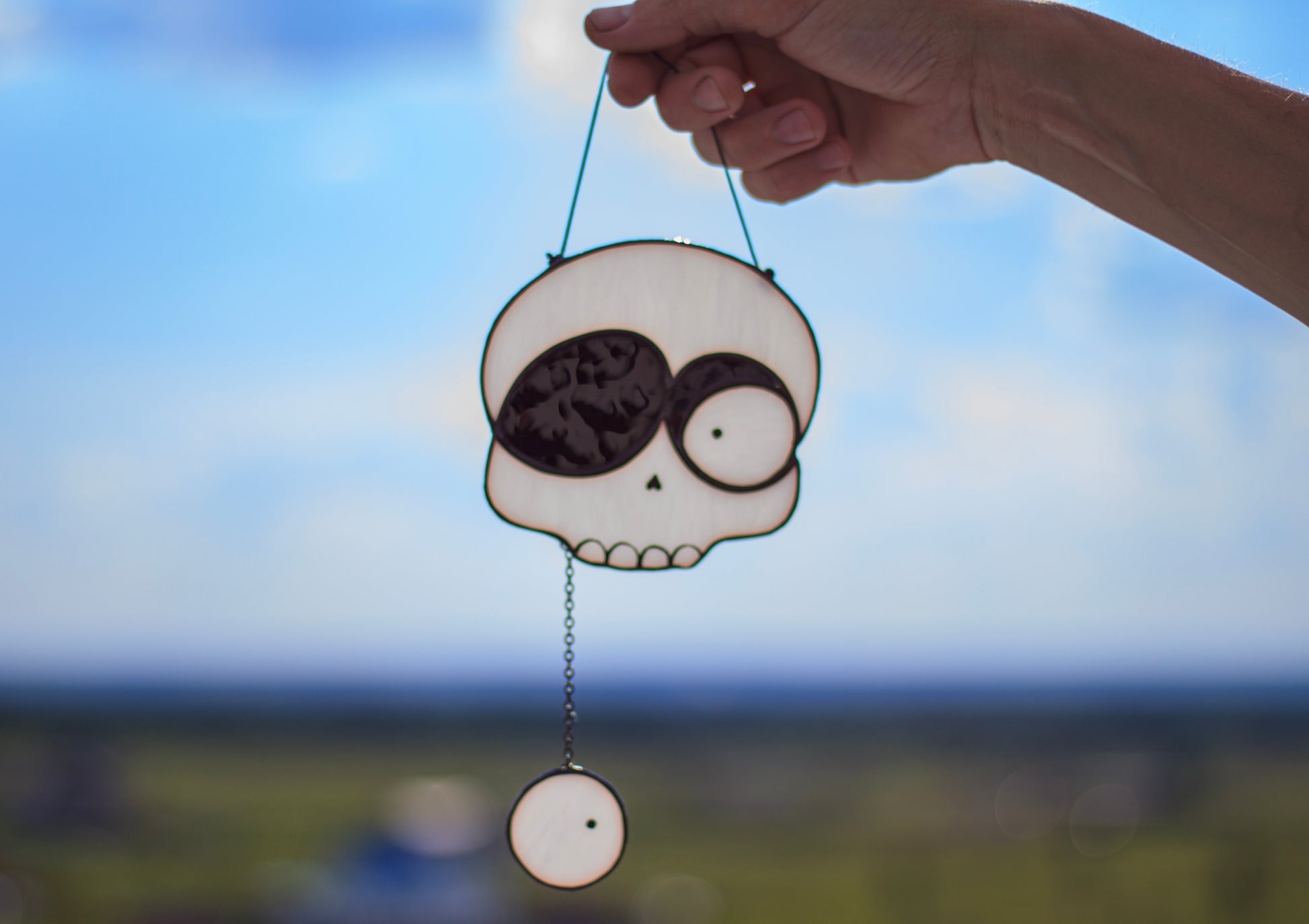 Halloween skull suncatcher hanging in window — spooky gothic decor, unique horror gift, Mojoartglass