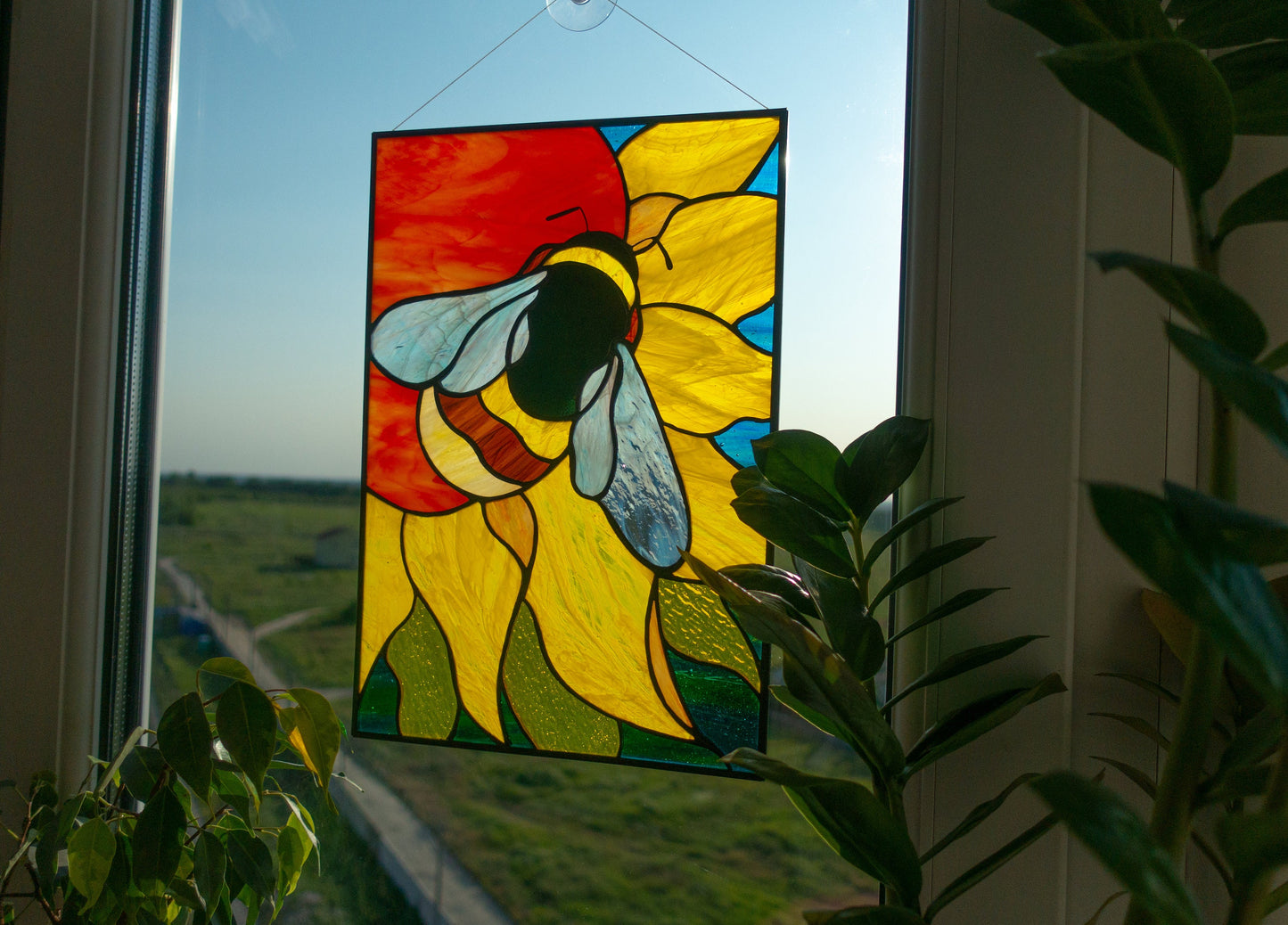 Honeybee on sunflower stained glass — golden amber petals, copper foil Tiffany method, made in Ukraine