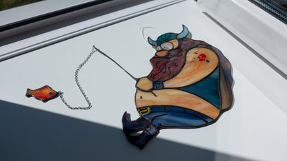 Handmade chonky Viking fisherman stained glass suncatcher — funny Norse warrior window art gift for him