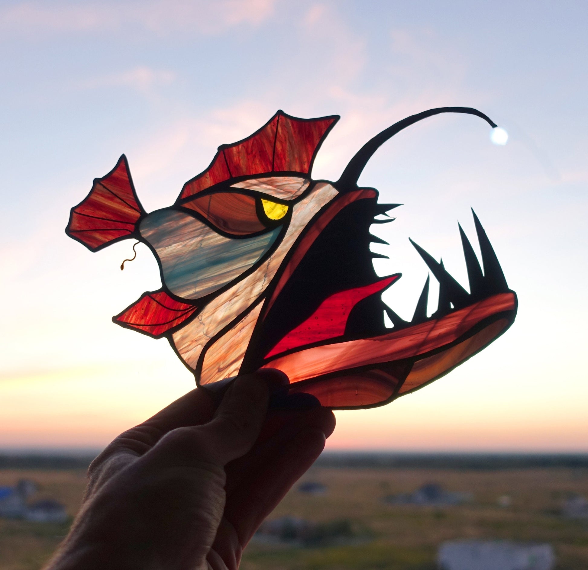 Handmade anglerfish deep sea night light stained glass suncatcher — weird ocean horror window art gift