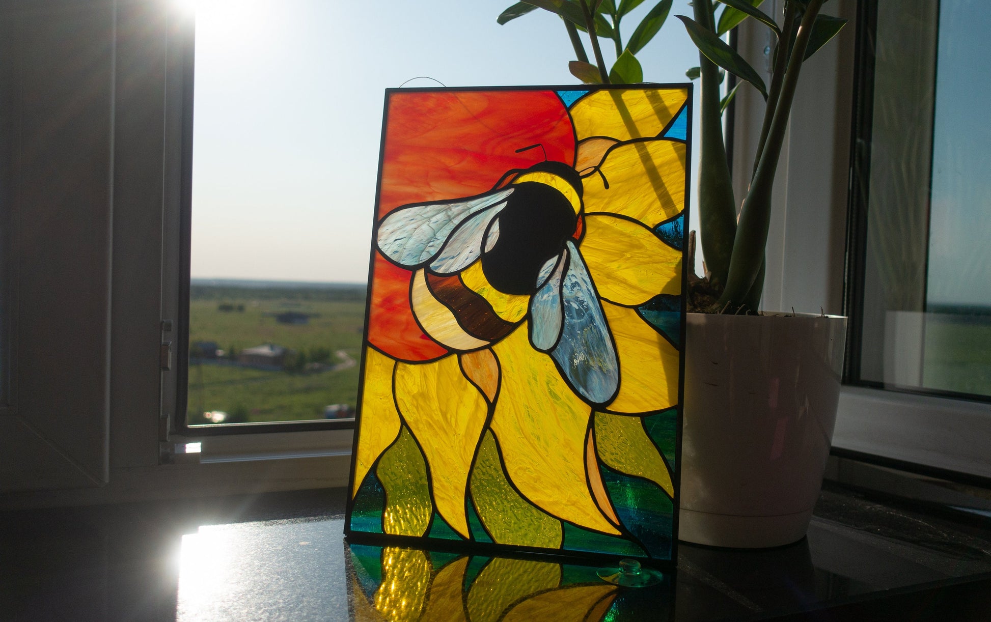 Handmade stained glass bee on sunflower suncatcher — garden pollinator window art, Mojoartglass