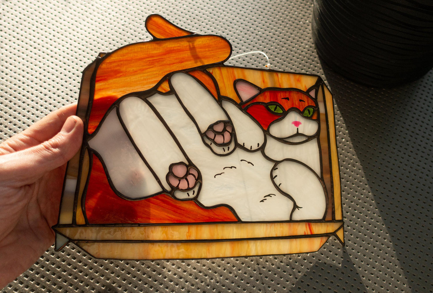 Handmade stained glass cat sitting in box — copper foil Tiffany technique, colorful meme art, made in Ukraine