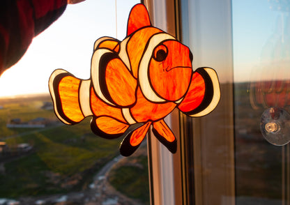 Handmade clownfish stained glass suncatcher — tropical orange fish coral reef window art ocean nature gift
