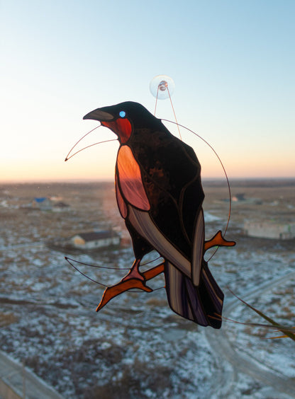 Tiffany copper foil black raven suncatcher detail — hand-cut dark glass feathers and silhouette
