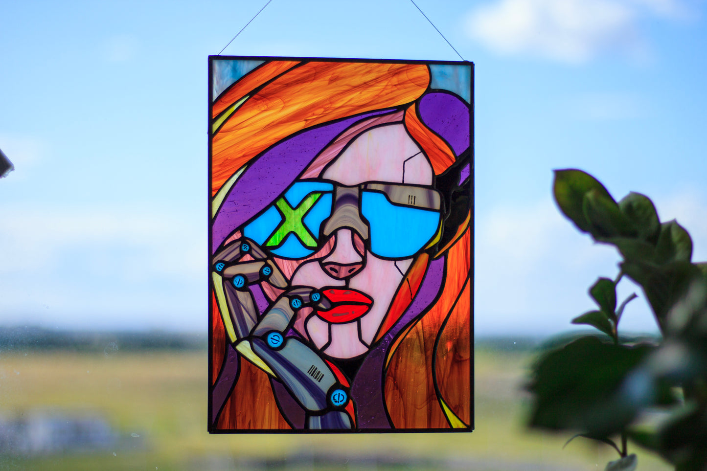 Handmade cyberpunk stained glass close-up — bold geometric lines, vivid neon colors, copper foil Tiffany method, made in Ukraine