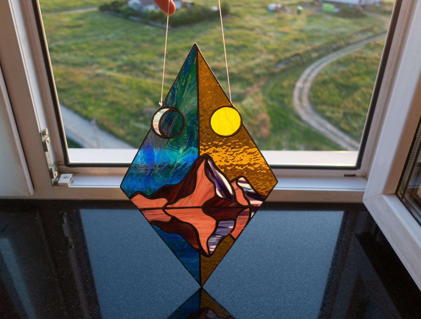 Handmade day and night mountain stained glass rhombus suncatcher — geometric nature window art decor