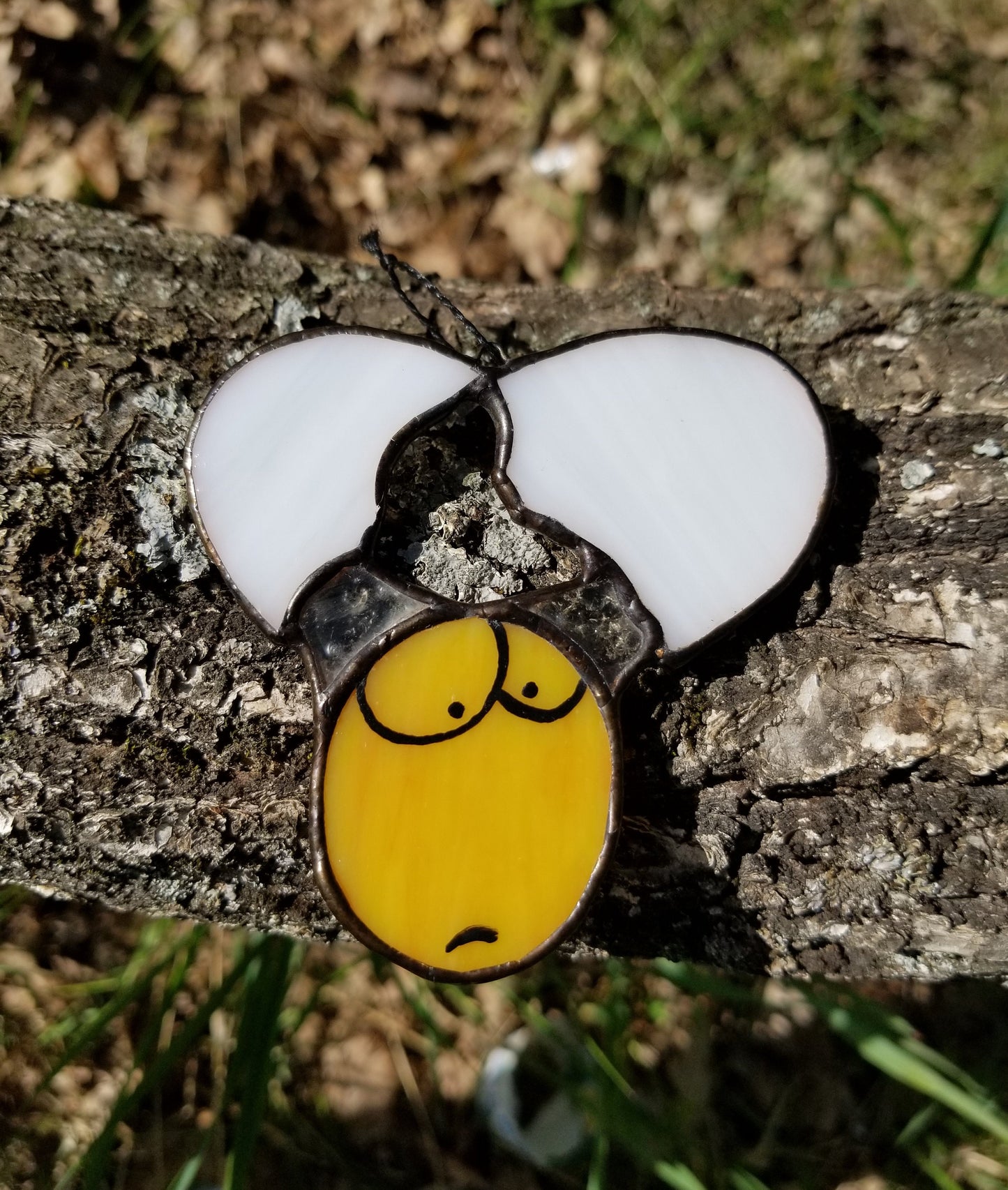 Tiny stained glass egg suncatcher hanging in window — Easter basket gift, handmade in Ukraine
