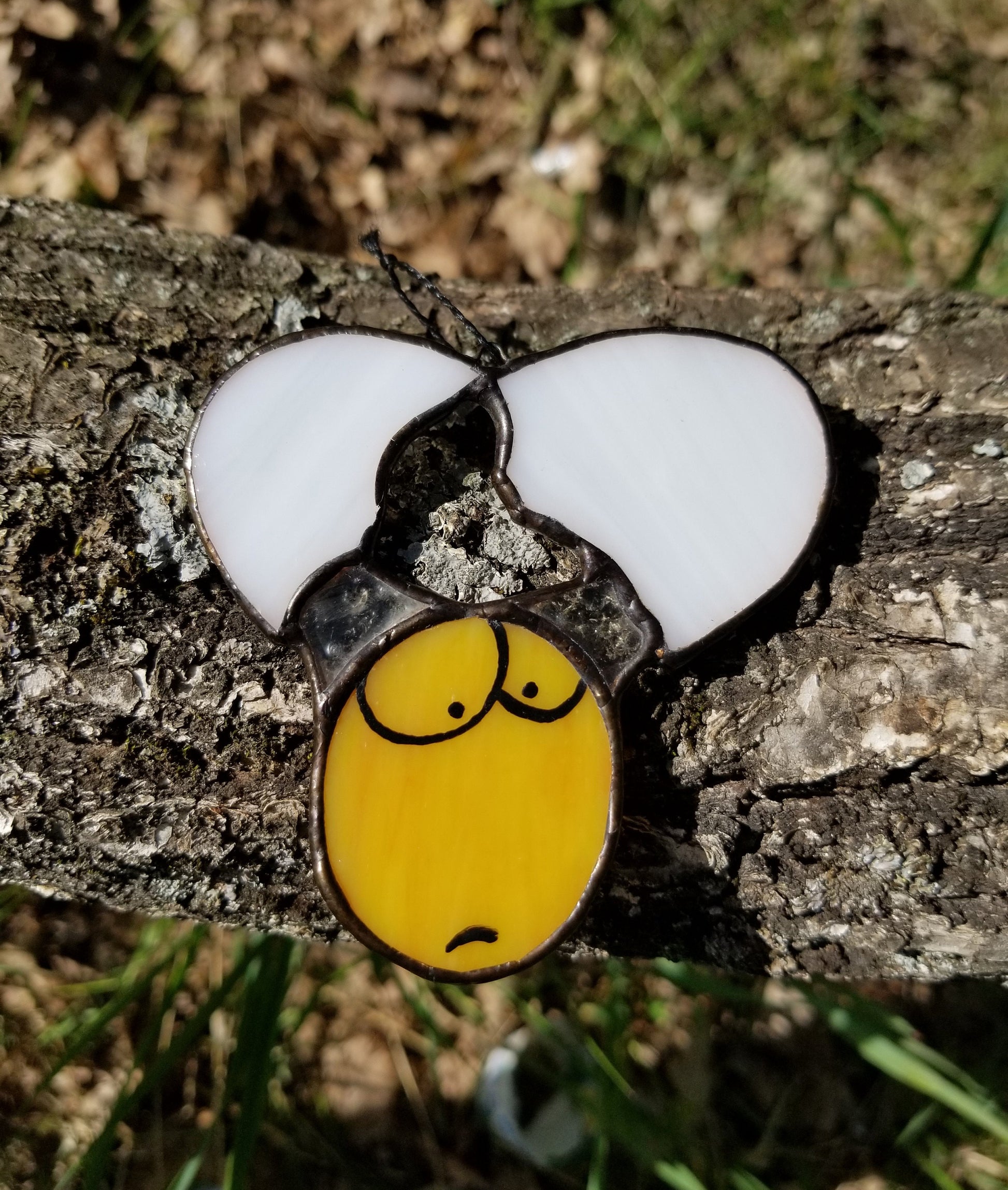 Tiny stained glass egg suncatcher hanging in window — Easter basket gift, handmade in Ukraine
