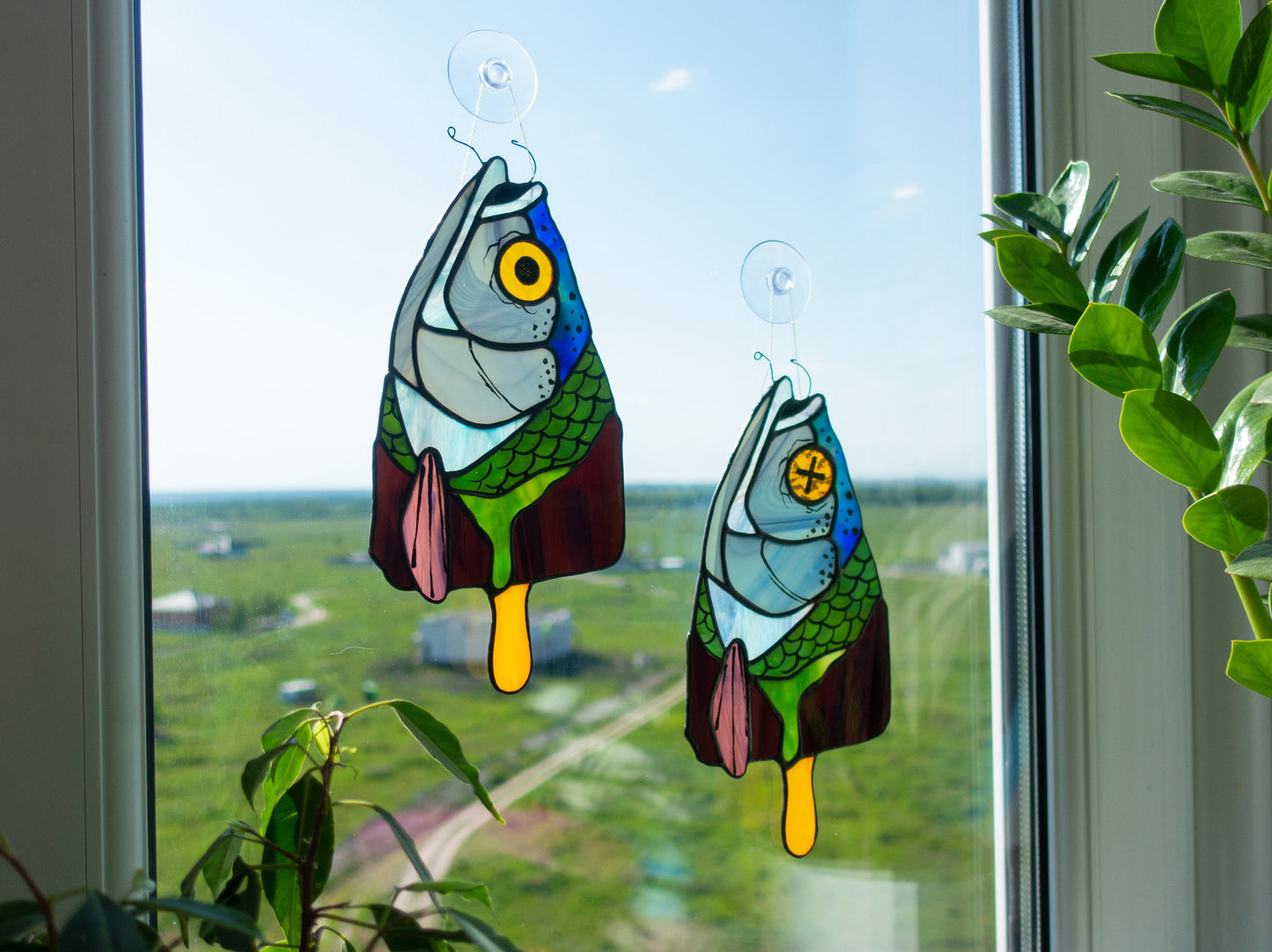 Surrealist fish popsicle stained glass — copper foil Tiffany method, 2 eye variants, made in Ukraine


