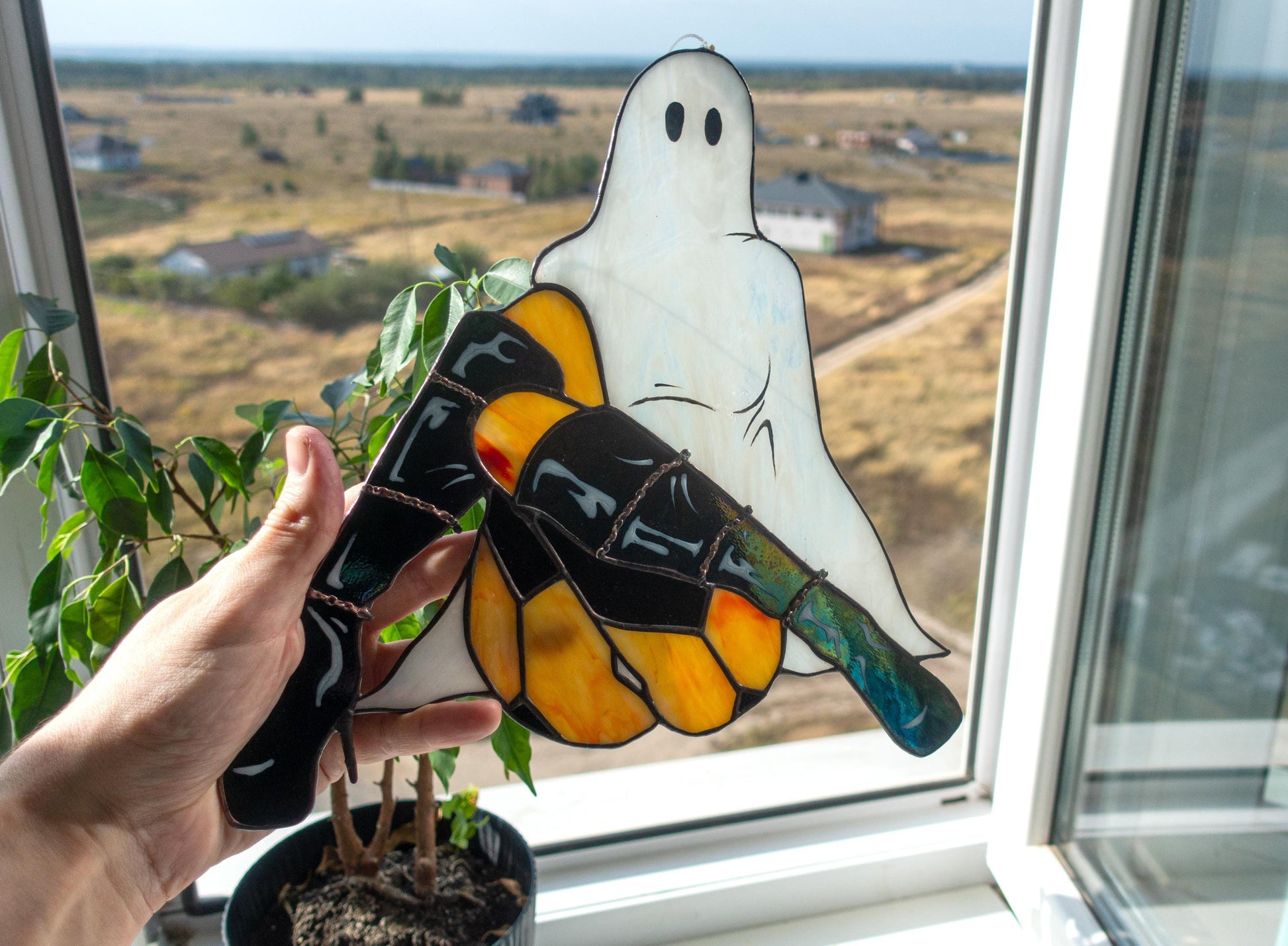 Handmade stained glass ghost girl suncatcher — spooky-cute Halloween window art, Mojoartglass