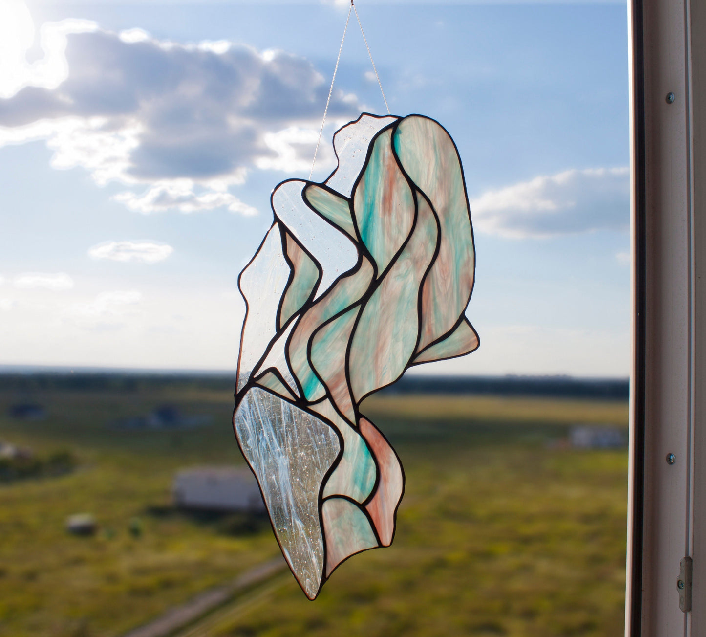 Abstract Female Silhouette Stained Glass Suncatcher — Flowing Feminine Form