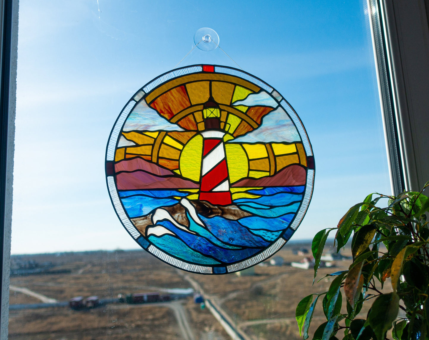 Handmade lighthouse stained glass round panel — coastal scene window hanging sailor beach decor gift