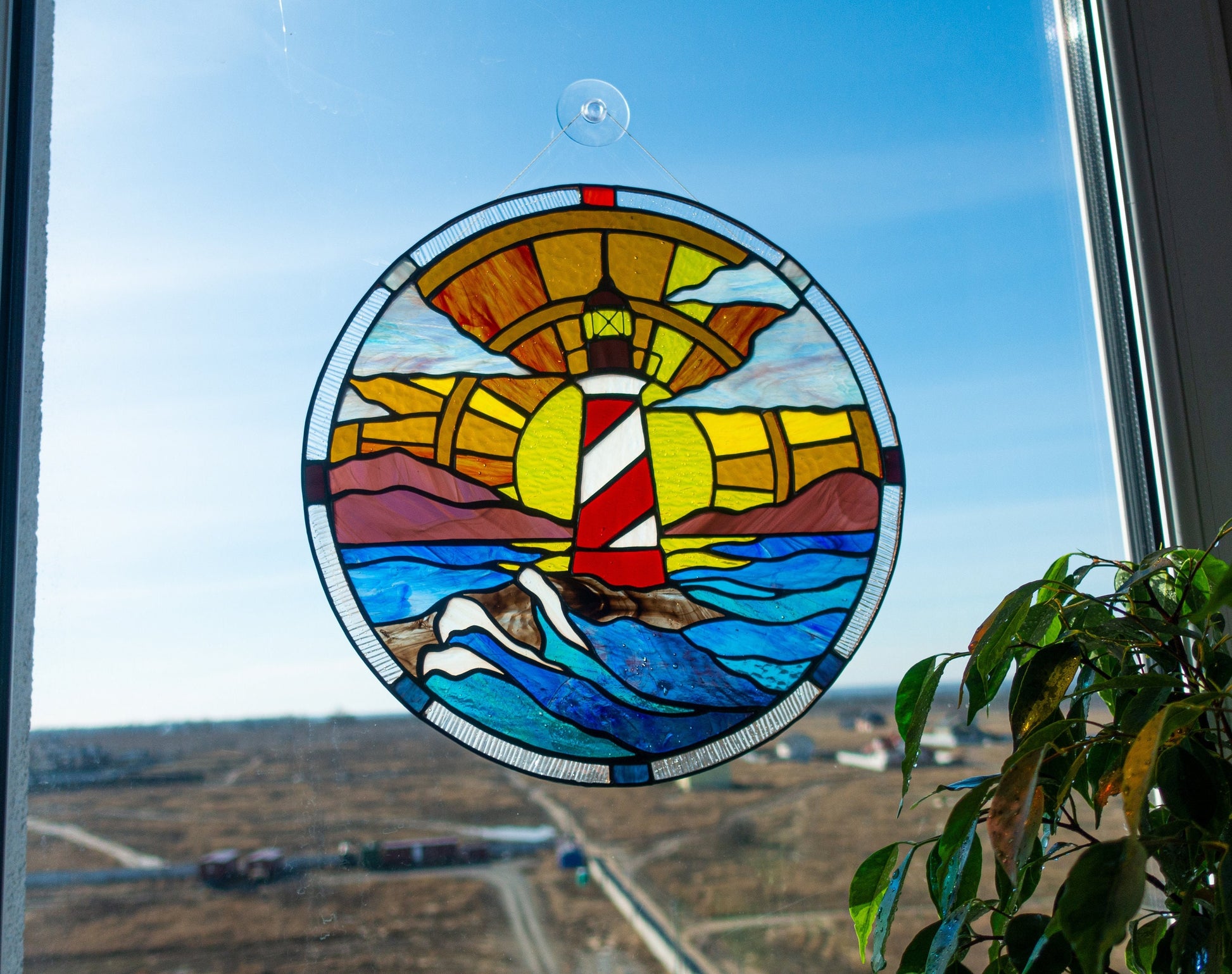 Handmade lighthouse stained glass round panel — coastal scene window hanging sailor beach decor gift