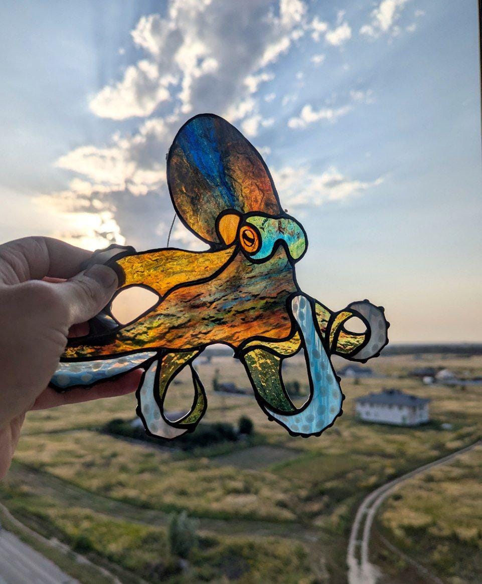 Handmade mystical kraken stained glass suncatcher — dark ocean octopus window art hanging gift