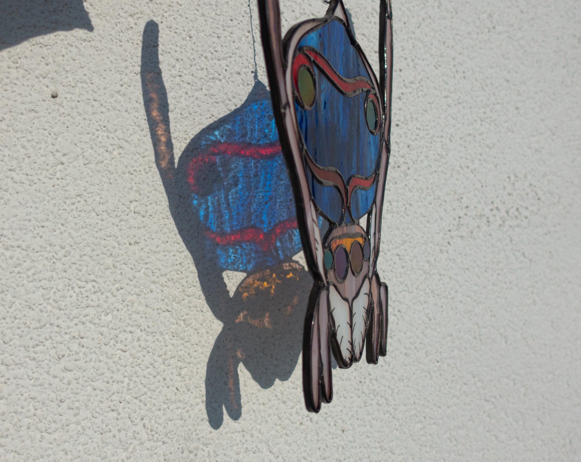 Stained glass peacock spider art — eight eyes iridescent fan detail, gift for spider lovers, Kyiv artist