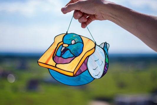Handmade stained glass bread pigeon suncatcher — funny derpy bird meme window art, Mojoartglass