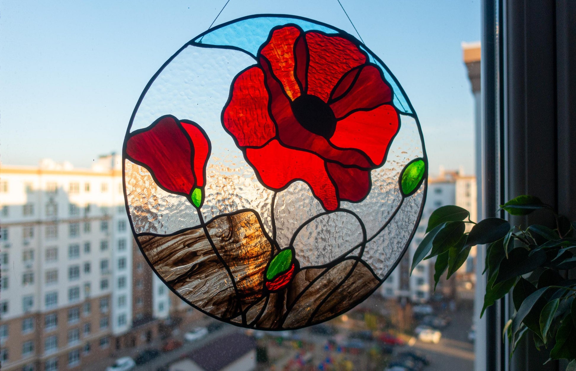Handmade red poppy stained glass round suncatcher — floral window hanging gift for flower lovers
