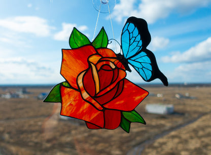 Stained glass rose butterfly suncatcher hanging in window — colorful floral light catcher, handmade gift for her
