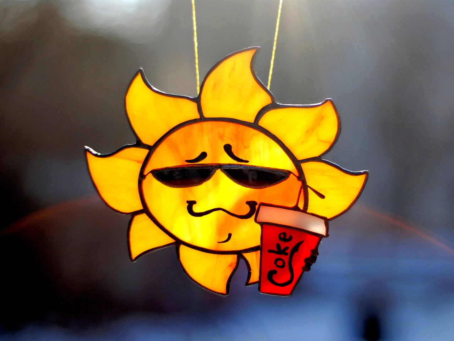 Handmade stained glass cool sun suncatcher — smiling sun in sunglasses with cola cup, Mojoartglass