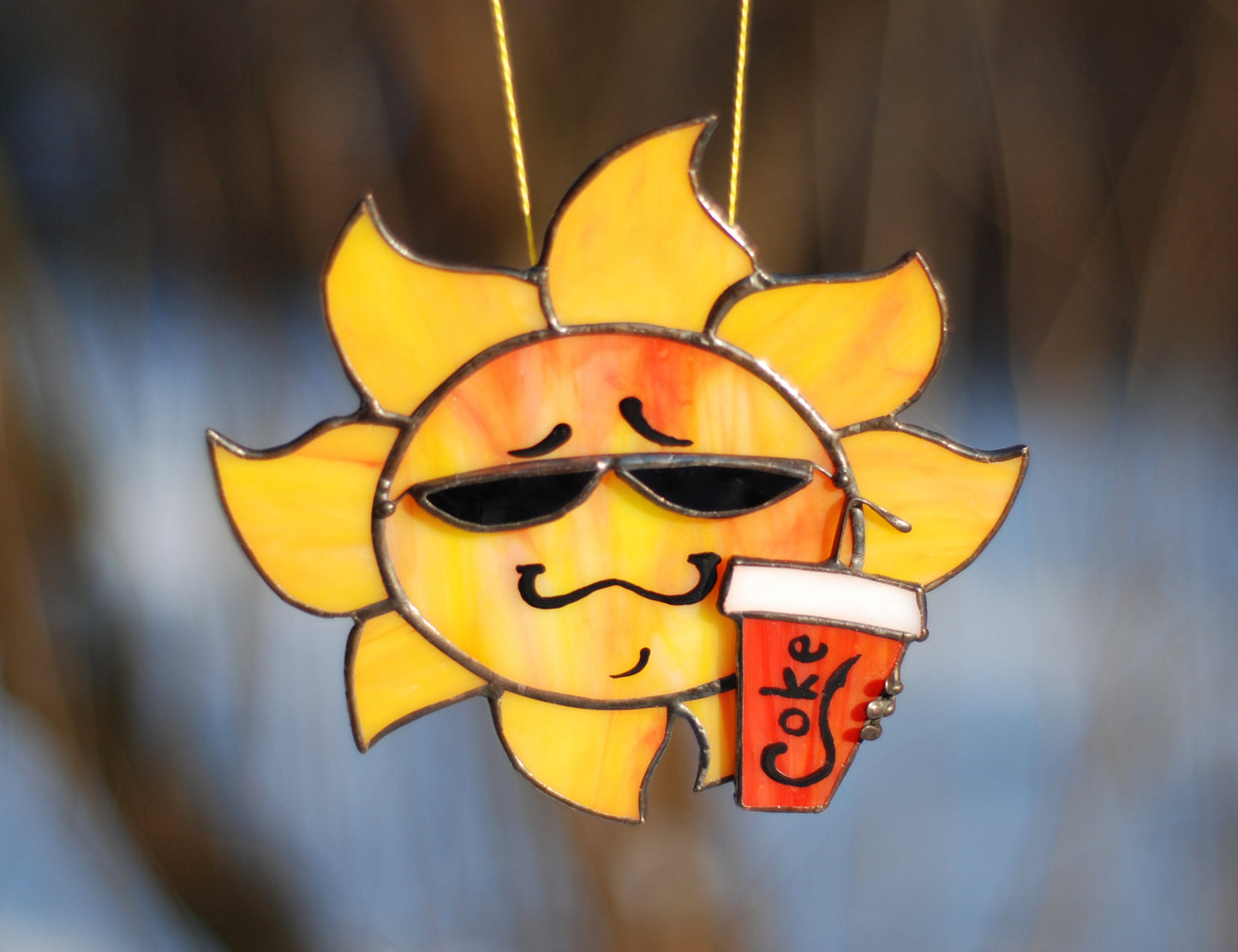 Funny sun stained glass — amber yellow glass, copper foil Tiffany method, made in Ukraine