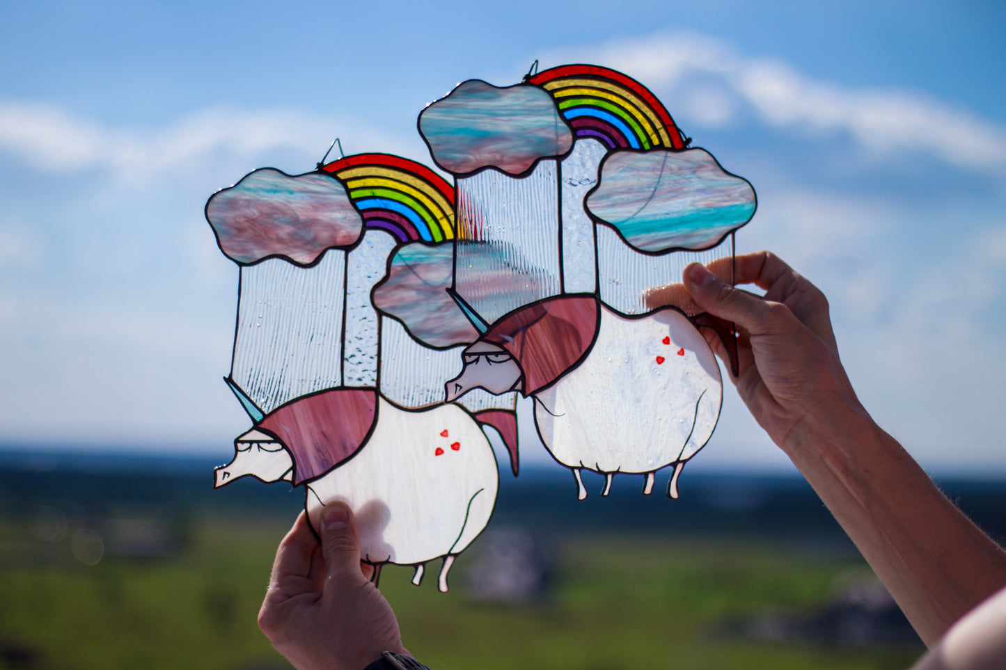 Funny quirky unicorn stained glass art — iridescent cloud and rainbow glass, copper foil detail