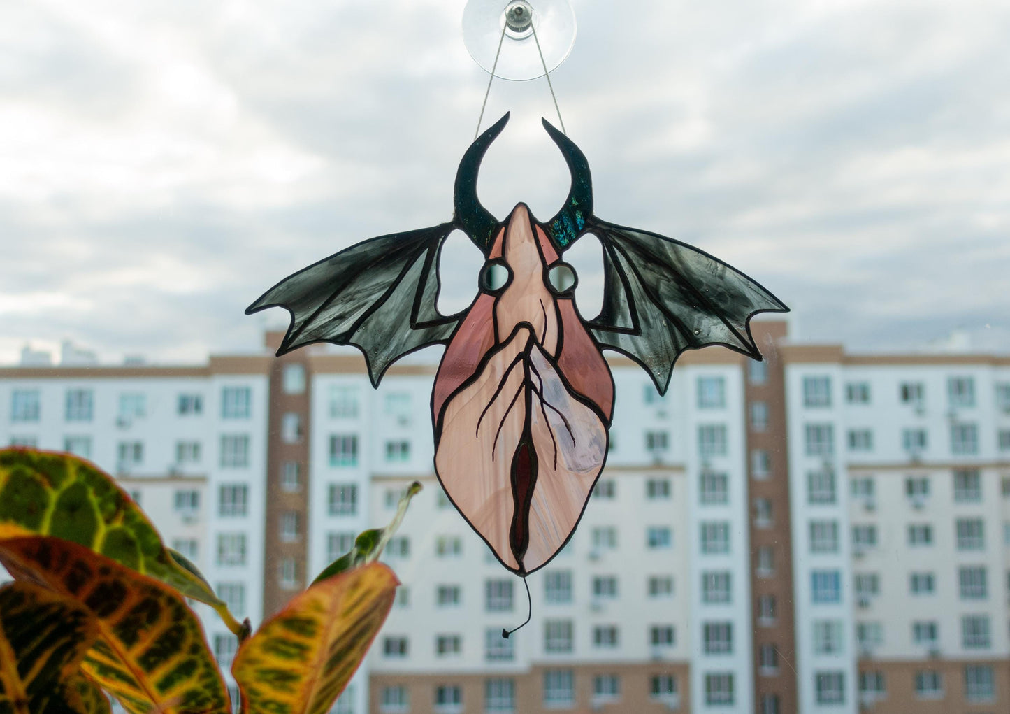 Handmade winged spirit stained glass suncatcher — iridescent horns, copper foil Tiffany technique, made in Ukraine